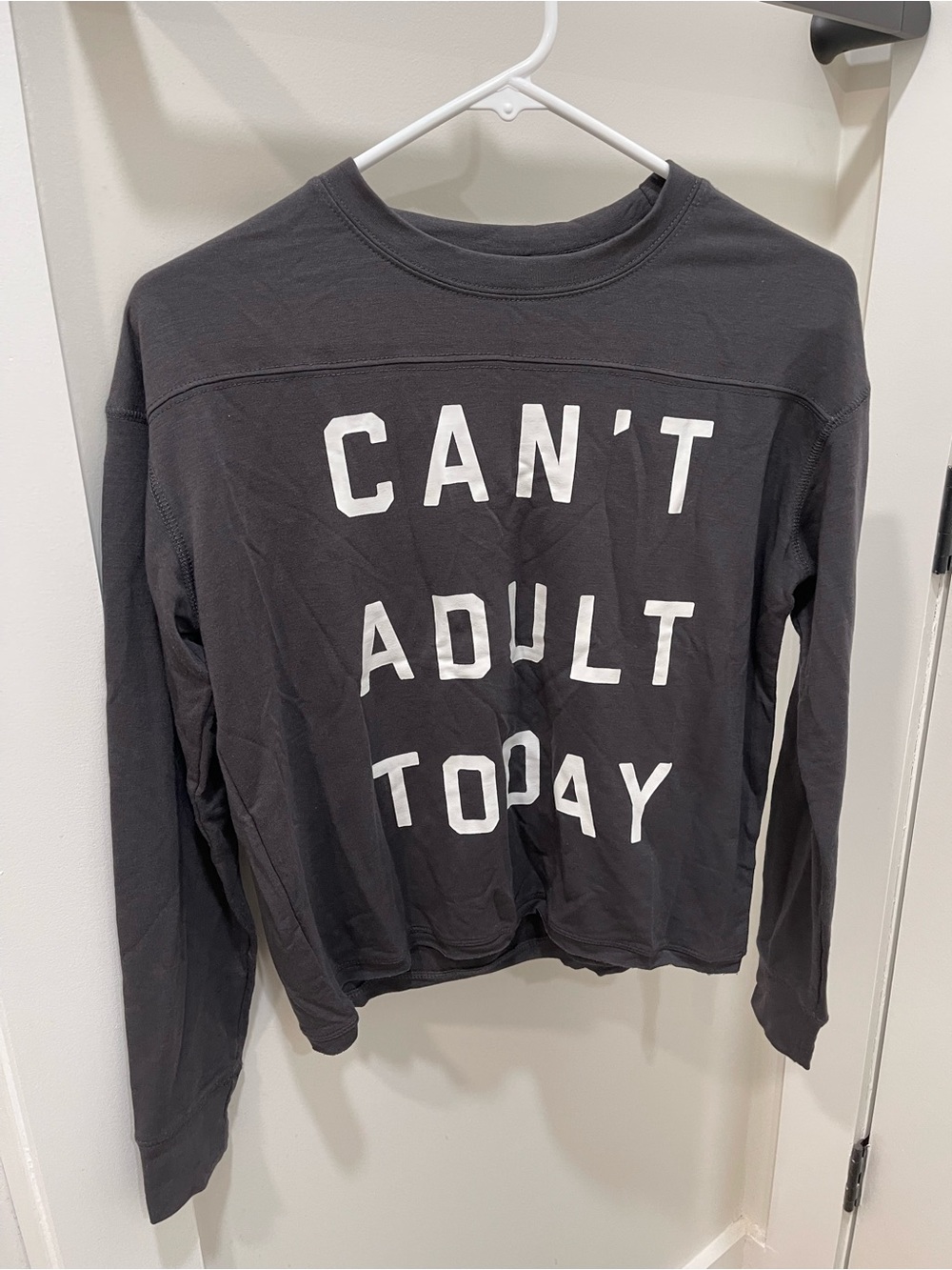Fifth Sun Washed Black Long Sleeve Top with White "CAN'T ADULT TODAY" Print